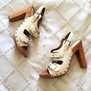 BCBGMAXAZRIA  white pebbled leather buckled clogs.